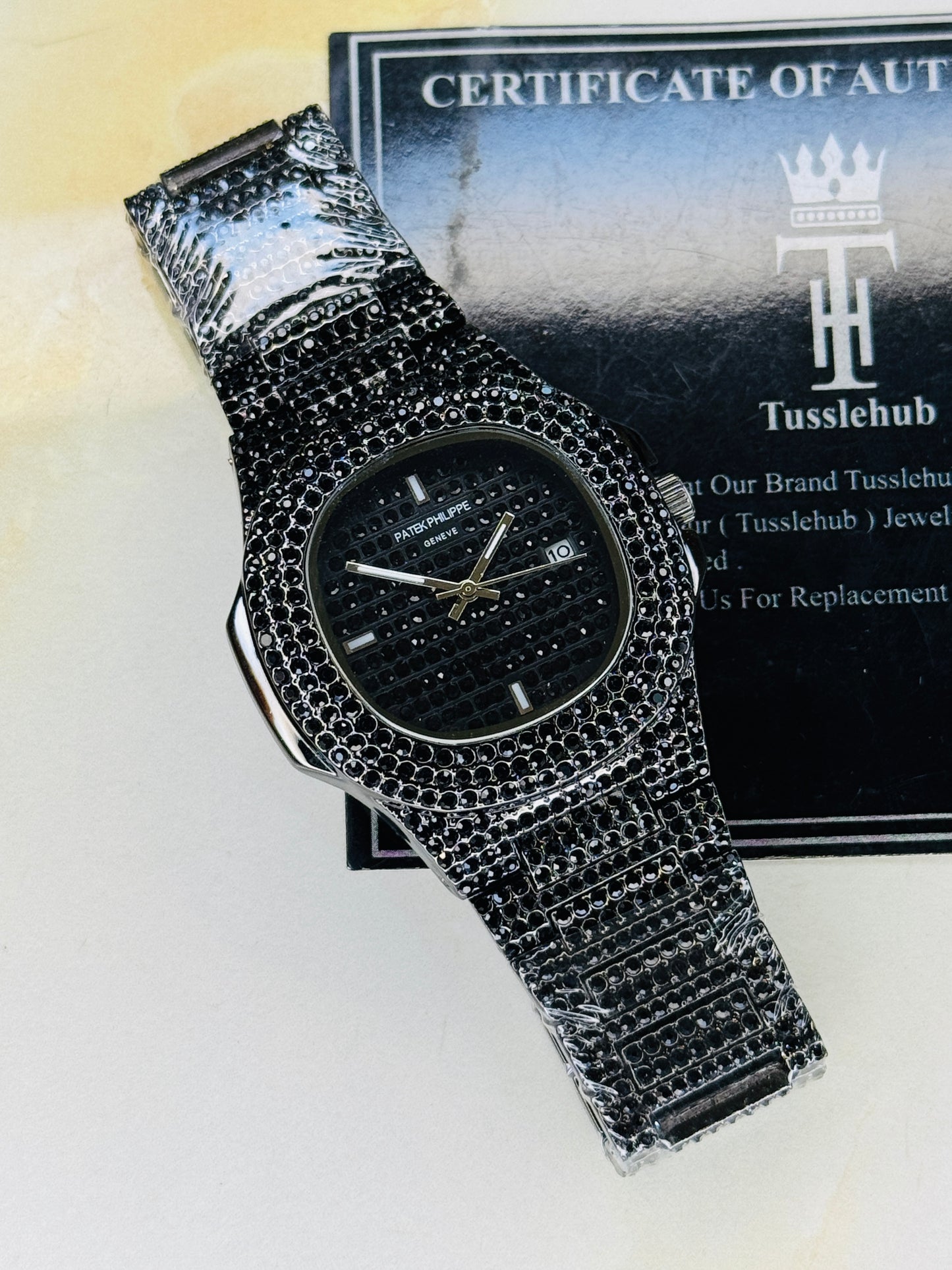 All Black Iced Out Nautilus Watch