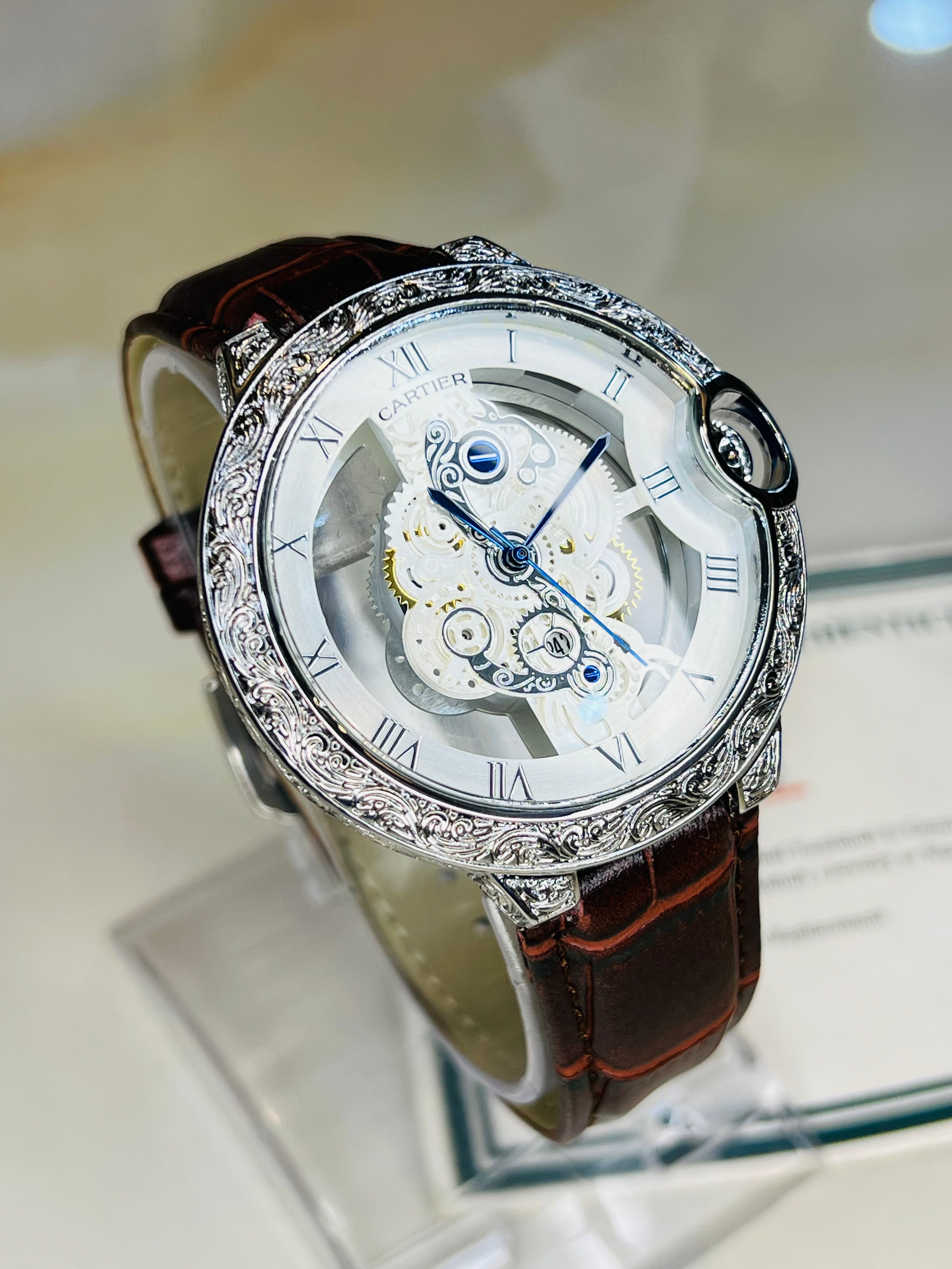 Brown Silver Engraved Skeleton Dial Watch
