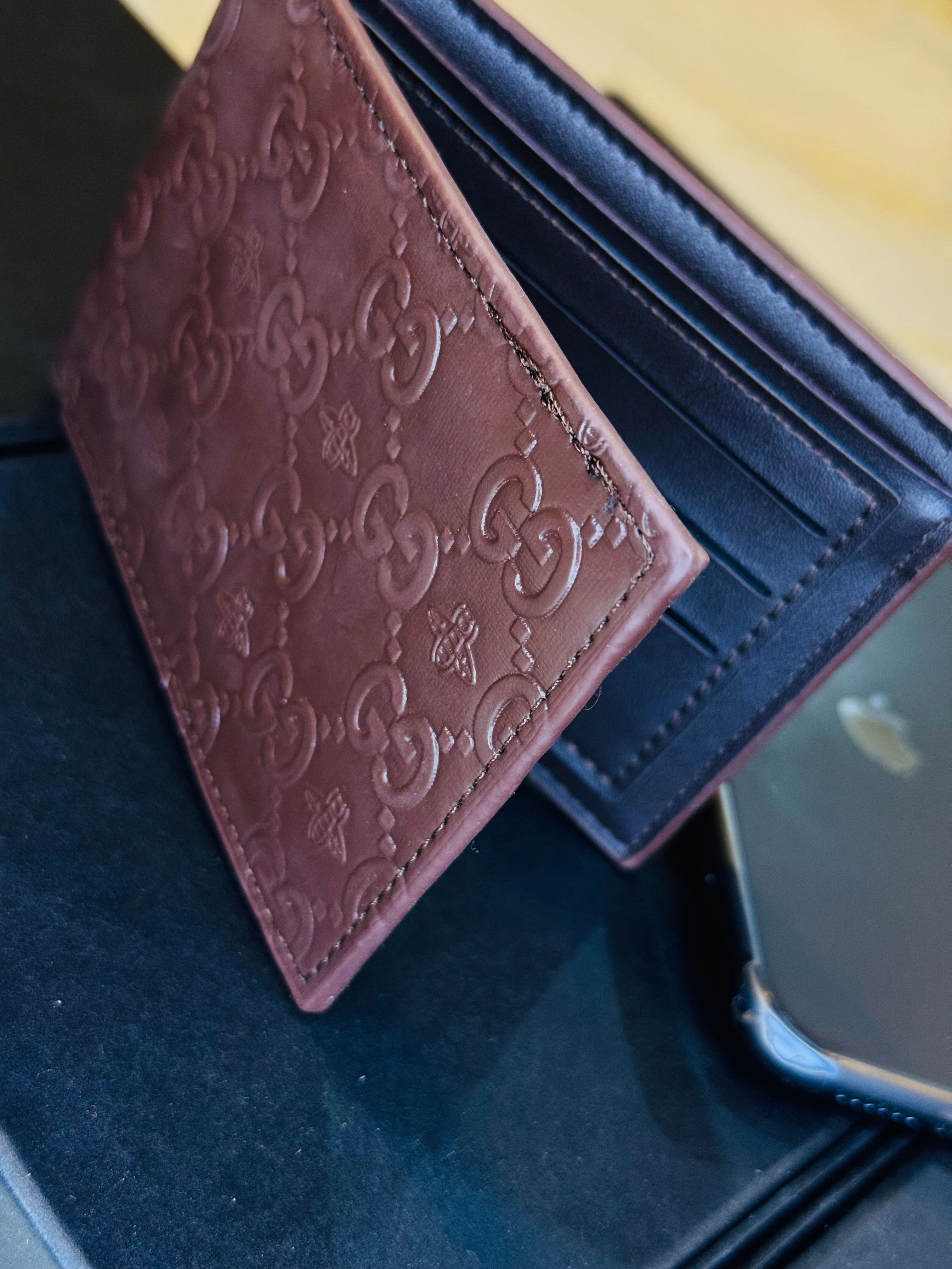 Brown Guc*i Bifold Wallet