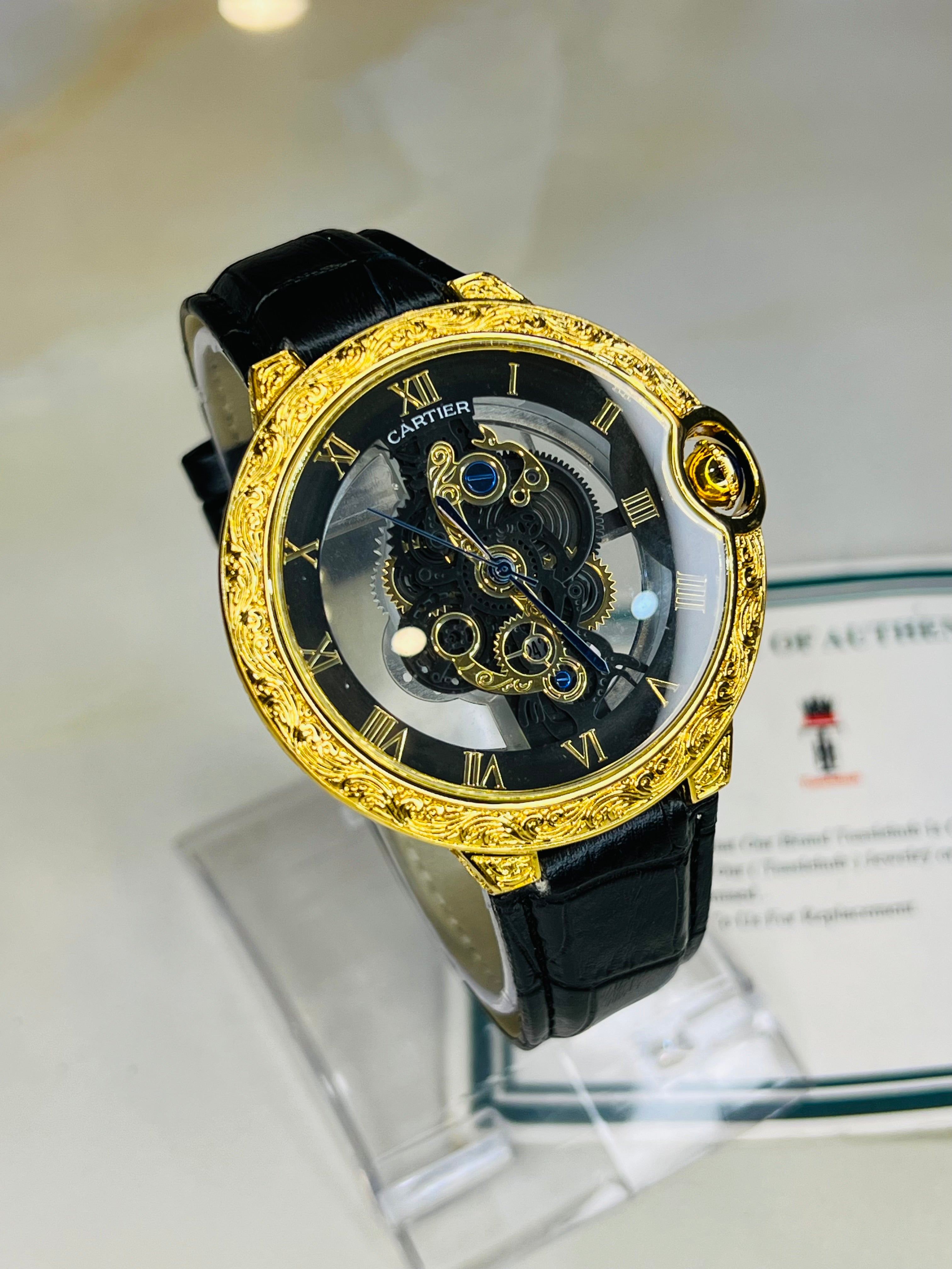 Black Gold Engraved Skeleton Dial Watch