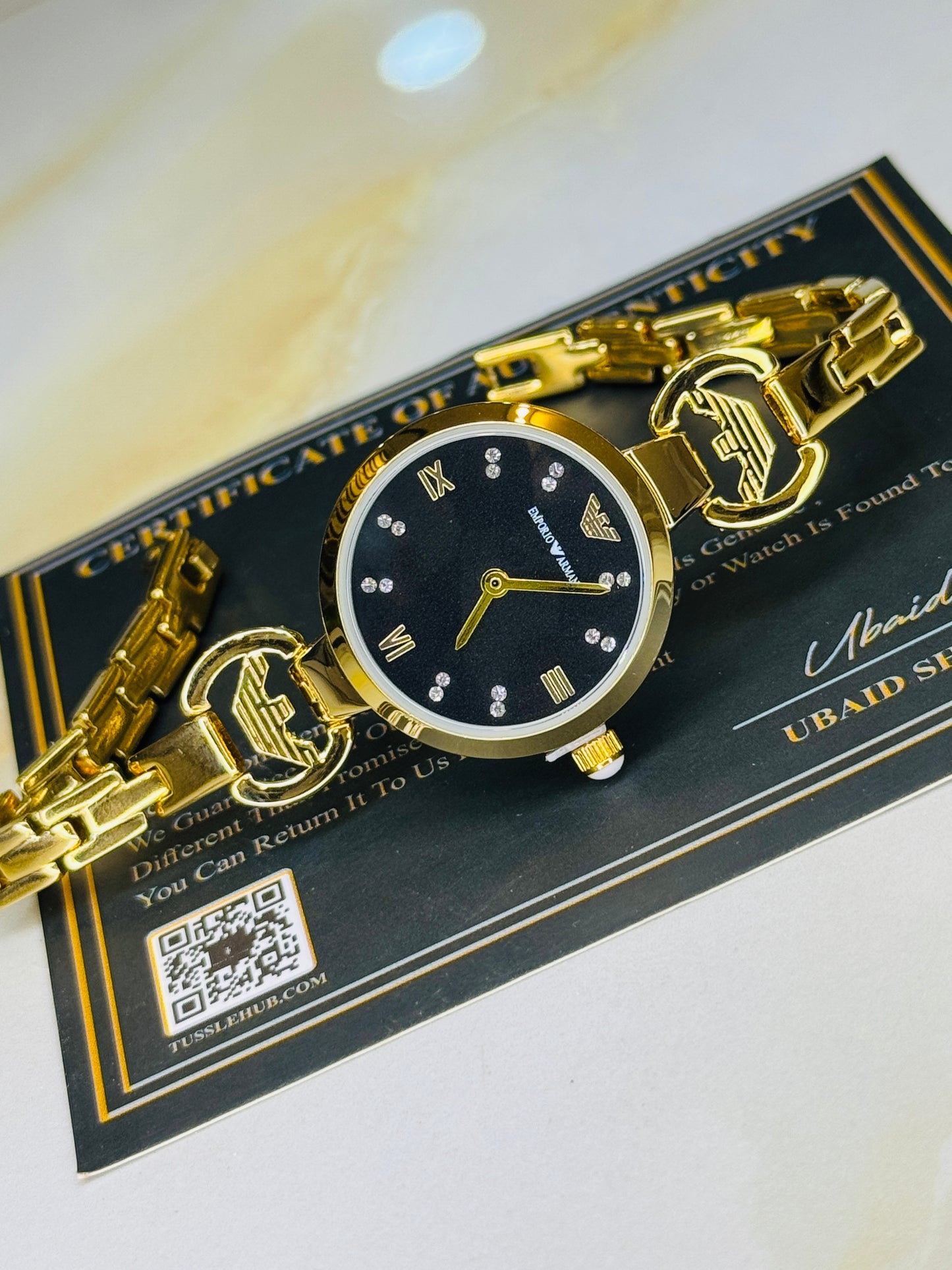Emporio Gold Black Watch for her