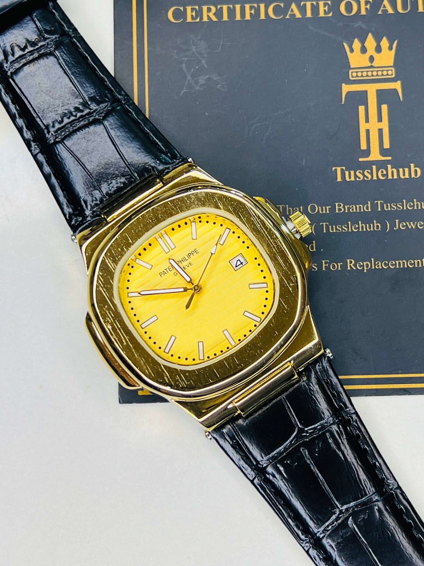 PP Black Leather Strapped Gold Nautilus Watch