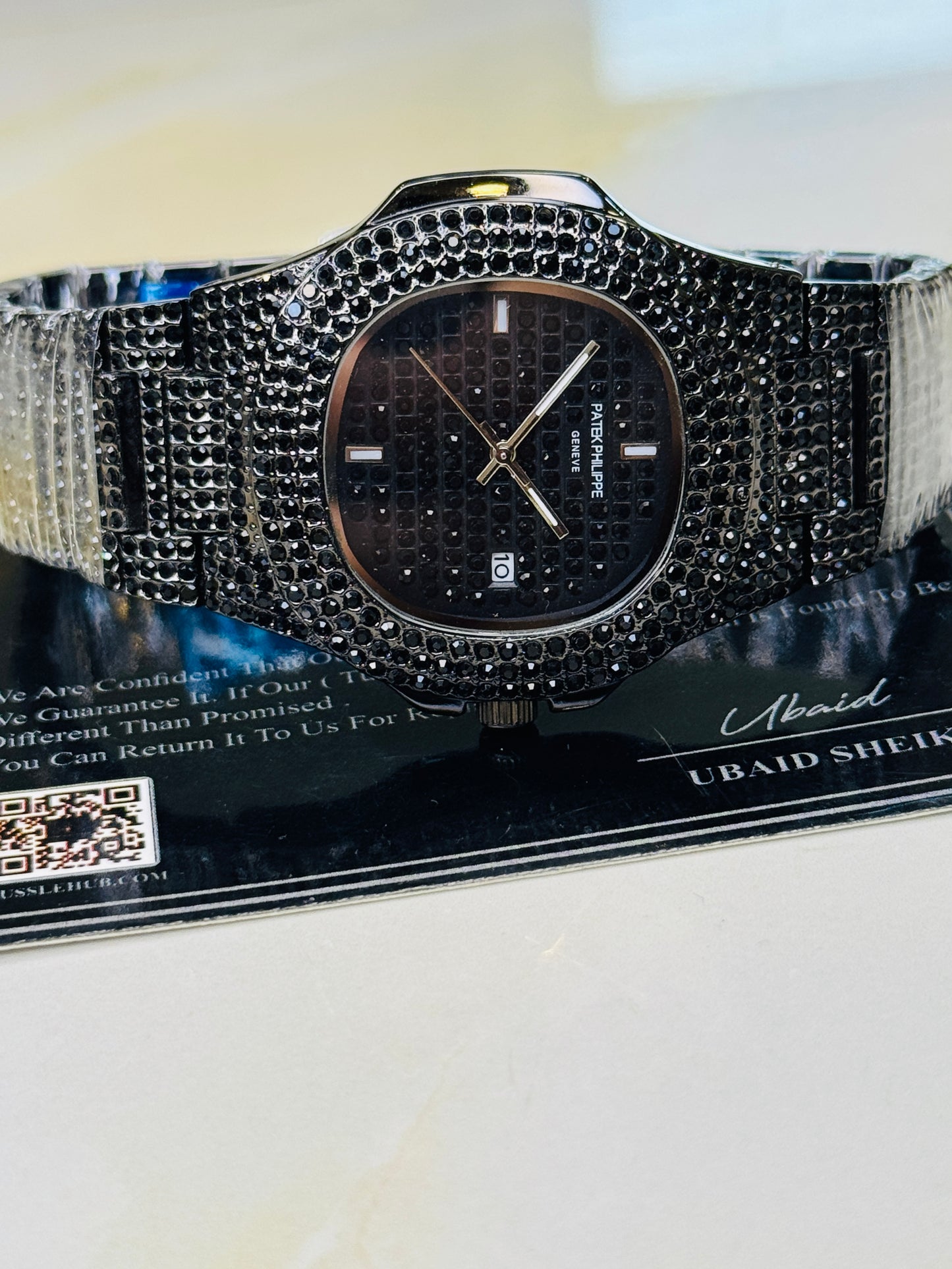 All Black Iced Out Nautilus Watch