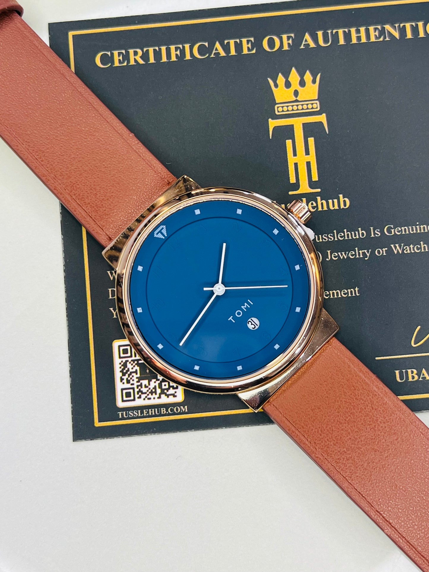 Tomi Brown Strapped Ocean Dial Elegance Watch