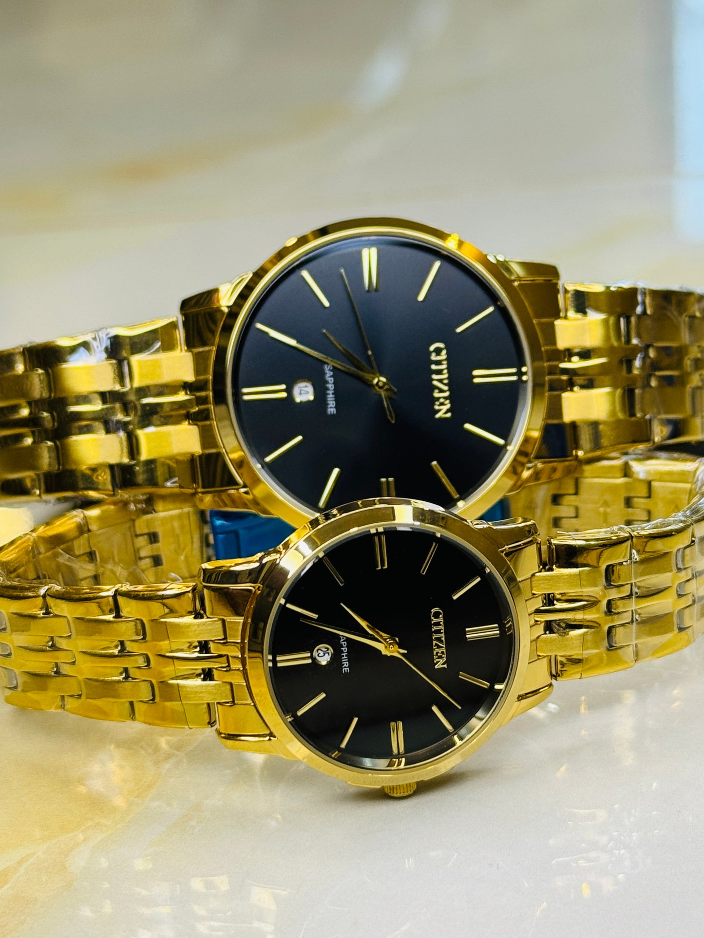 Gold Black Down Date Citizen Couple Watch