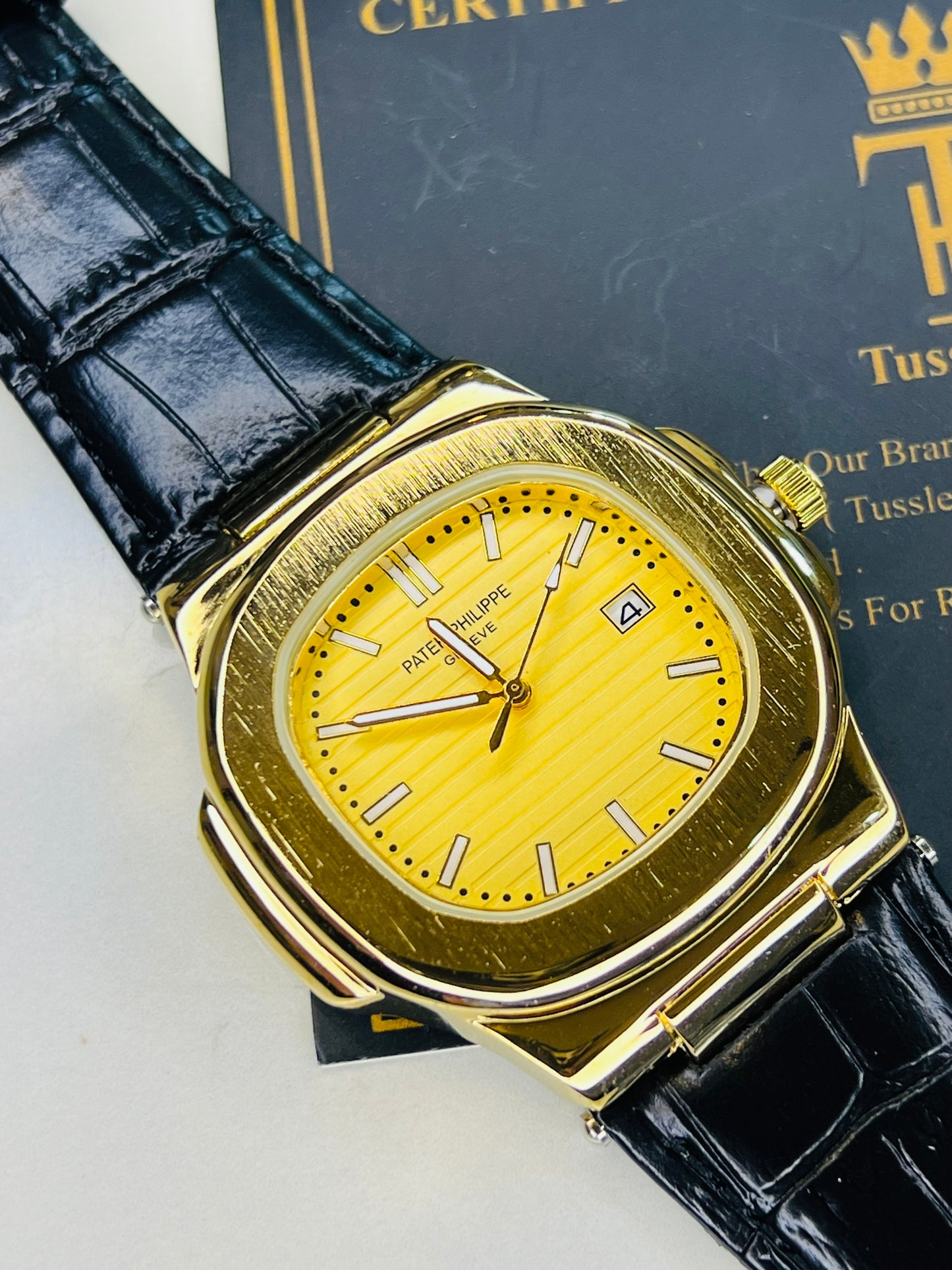 PP Black Leather Strapped Gold Nautilus Watch