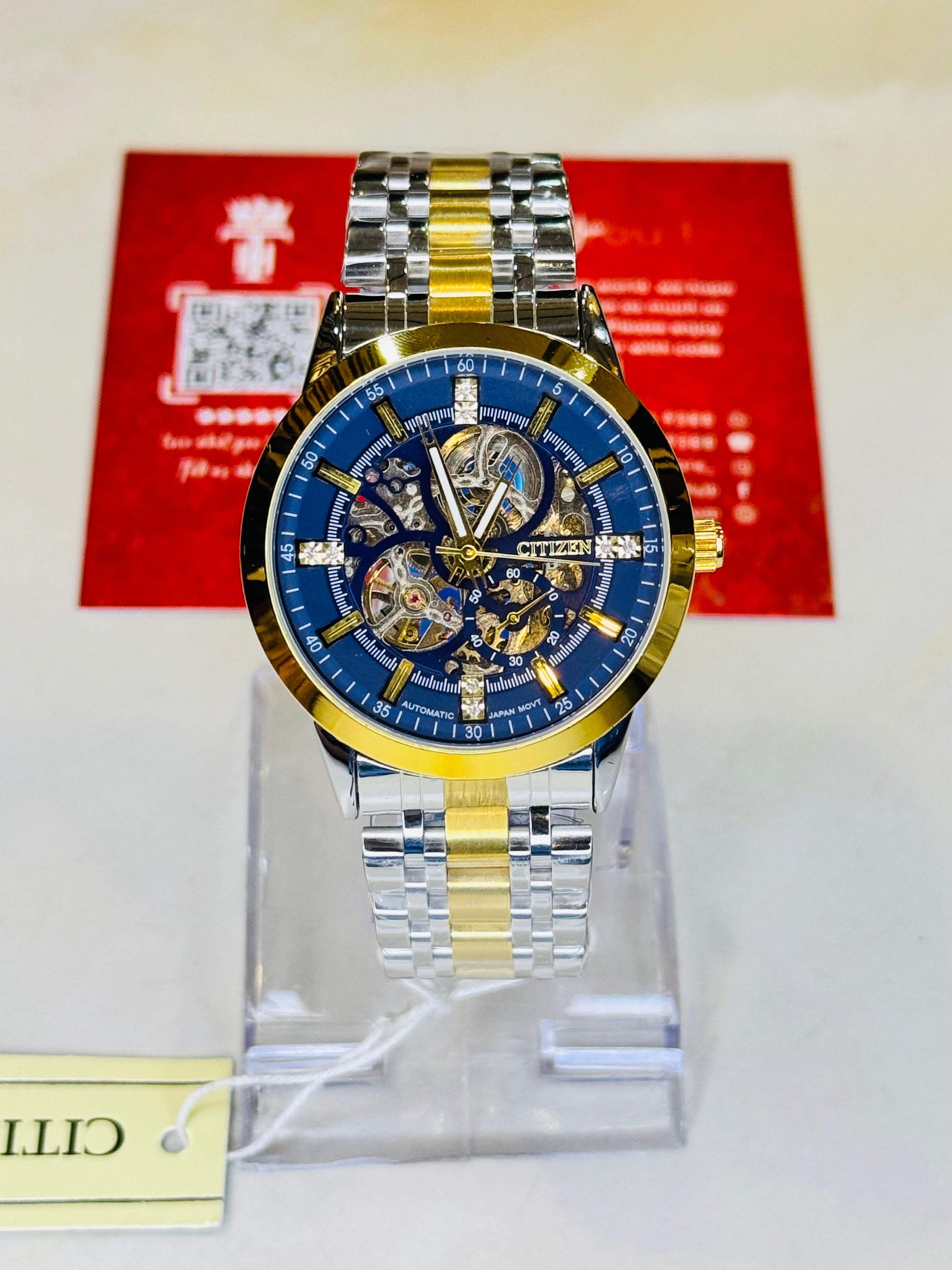 Two Tone Navy Citizen Skeleton Automatic Watch