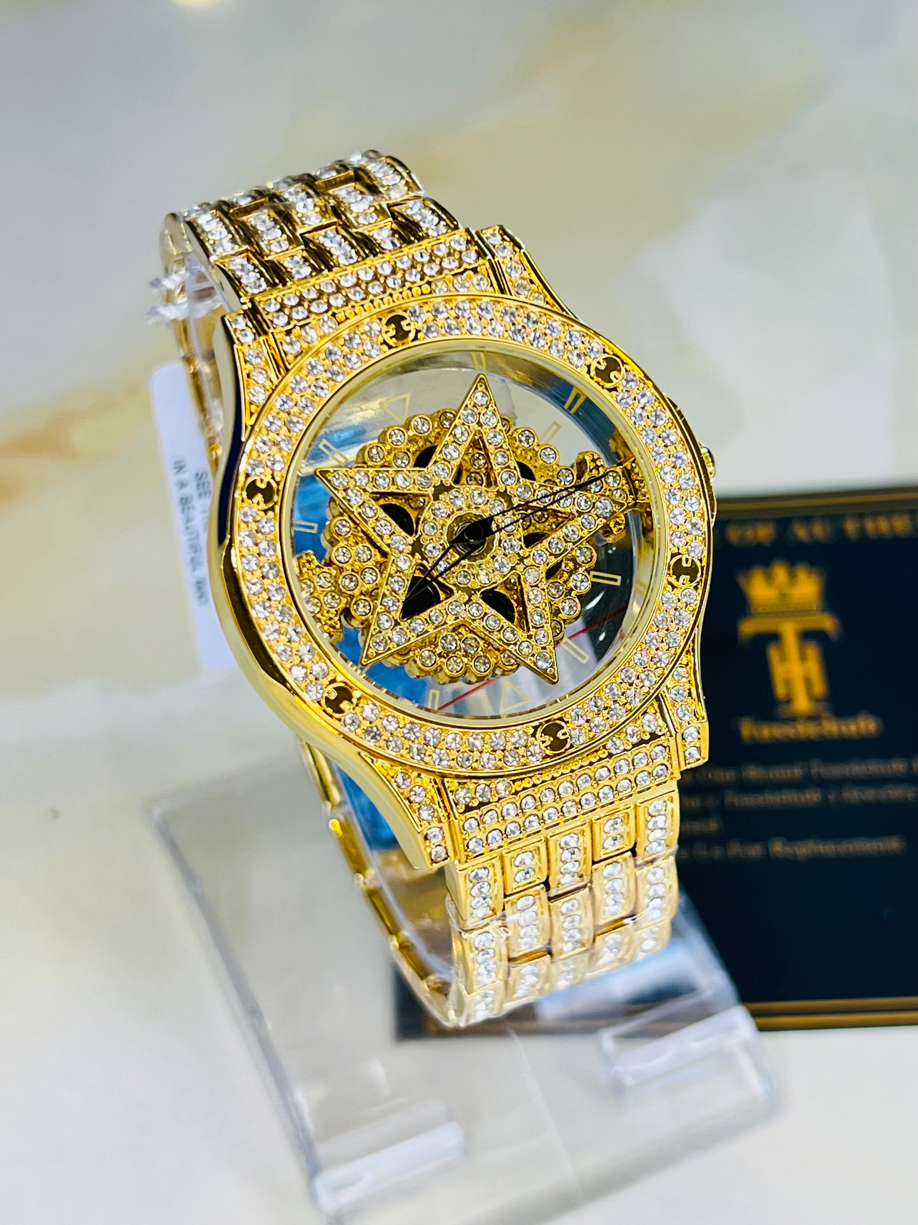 Gold Iced Out Spinner Star Dial Watch