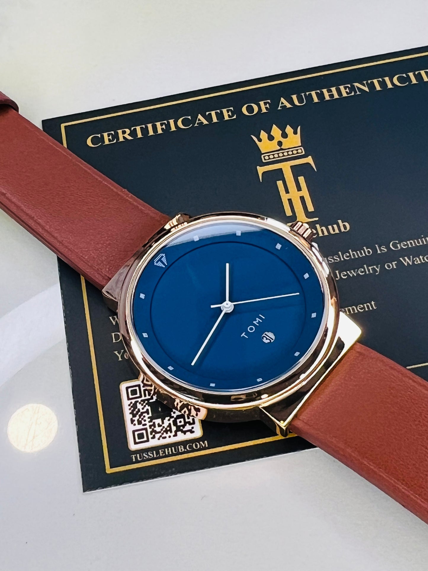 Tomi Brown Strapped Ocean Dial Elegance Watch