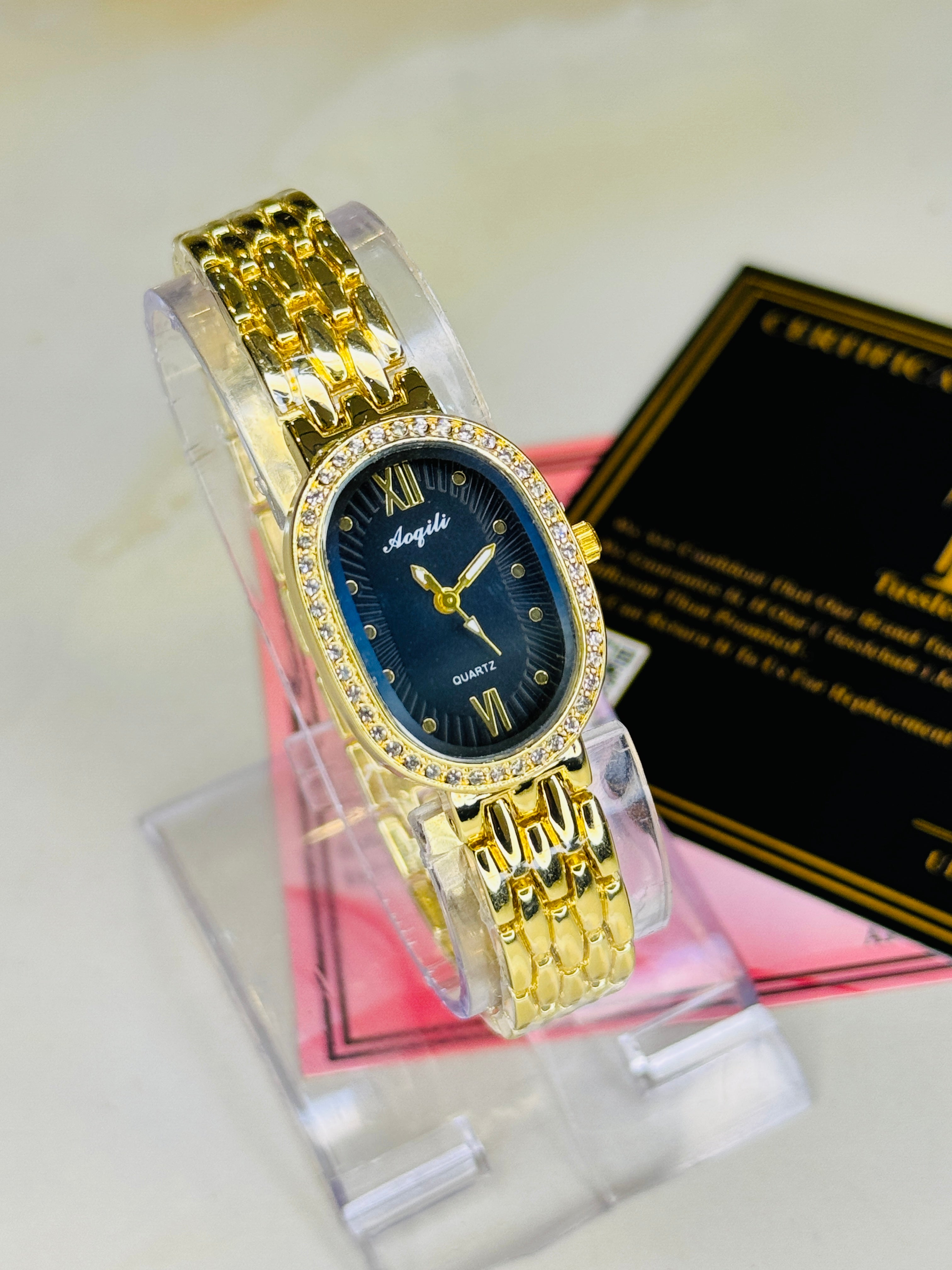 Aoqili Oval Gold Black Watch for her