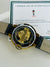 Black Strapped Gold Skeleton Dial Watch